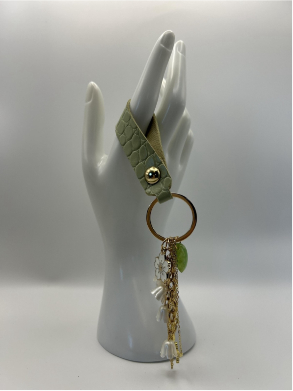 Bracelet Green Faux Leather Snap Tassel Charm Flower Cross Gold Tone 9.5 In